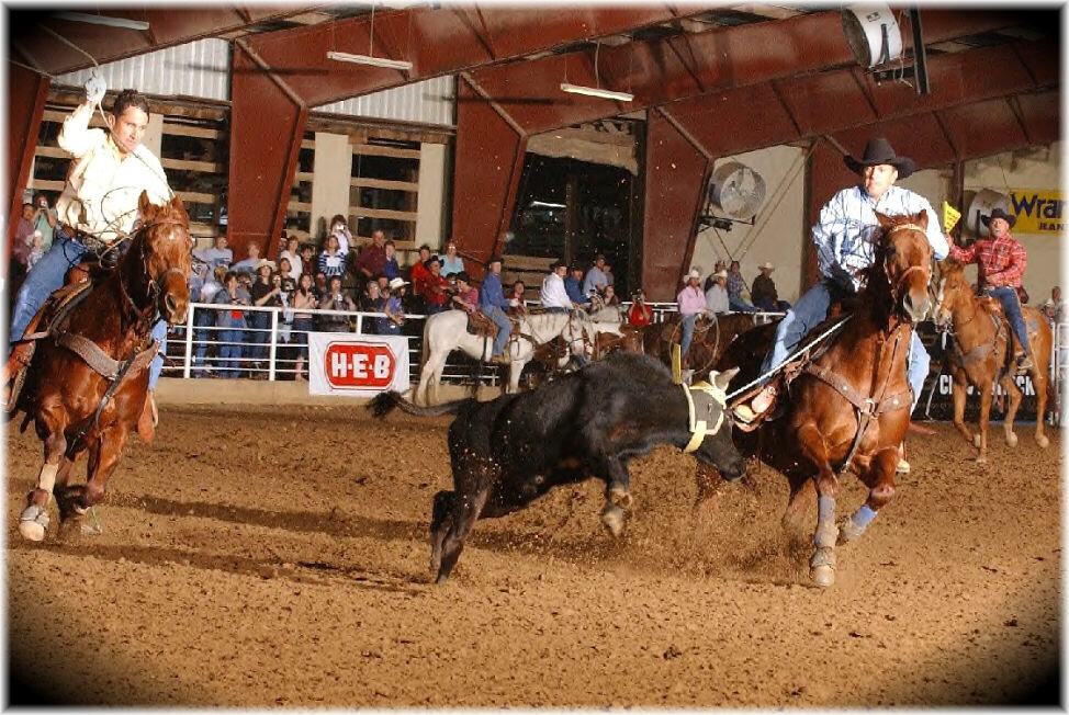 George as header and his partner Bret Beach, at the San Antonio Rose Palace, 2002.